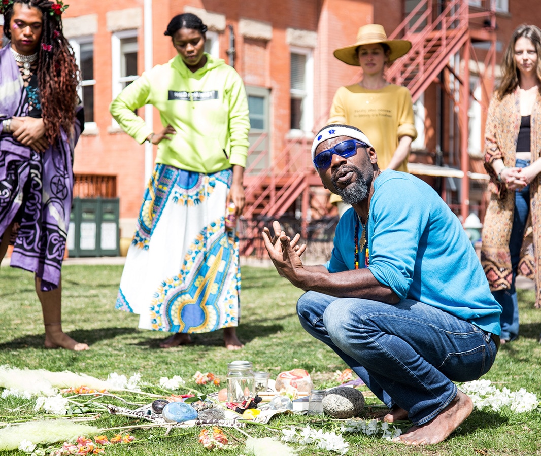 Naropa students gathered in a circle during a course activity.