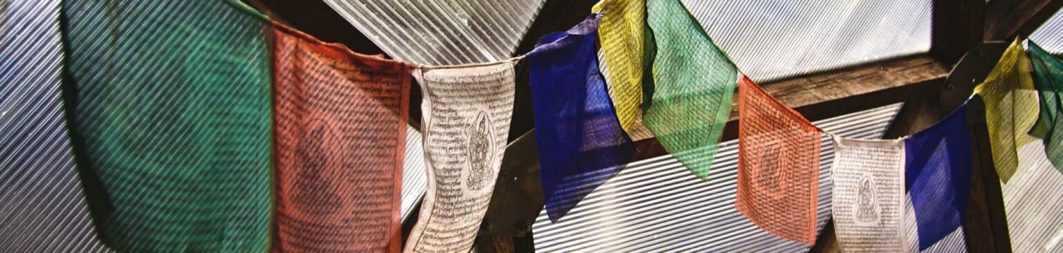 Buddhist prayer flags in the greenhouse
