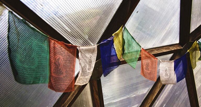 Buddhist prayer flags in the greenhouse