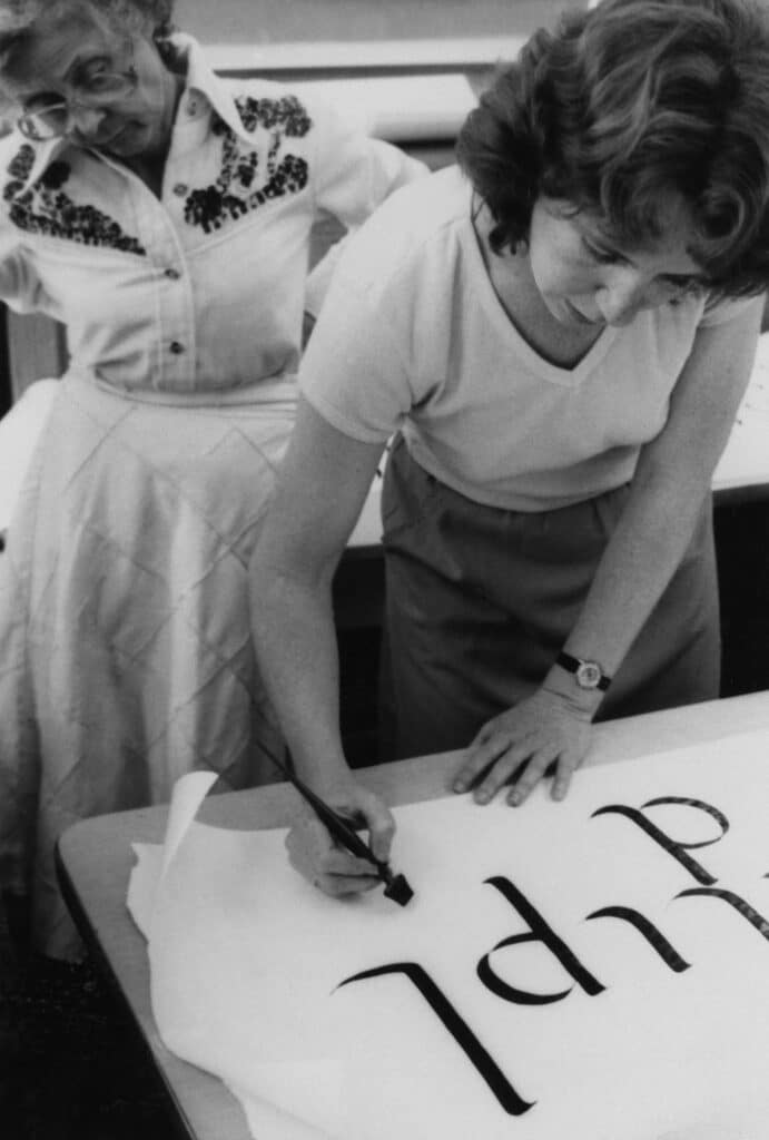 Barbara Bash doing calligraphy