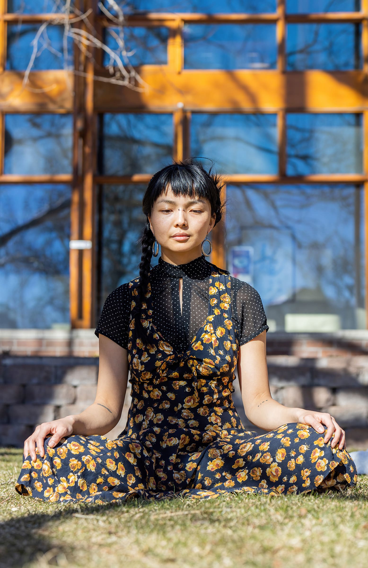 Natalie Hsu meditates on the Naropa green