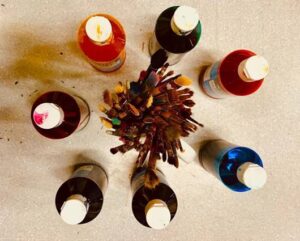 Paints and brushes in the Naropa Community Art Studio