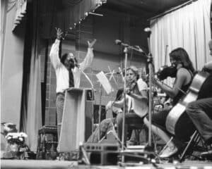 The poet Allen Ginsberg leads a class in music