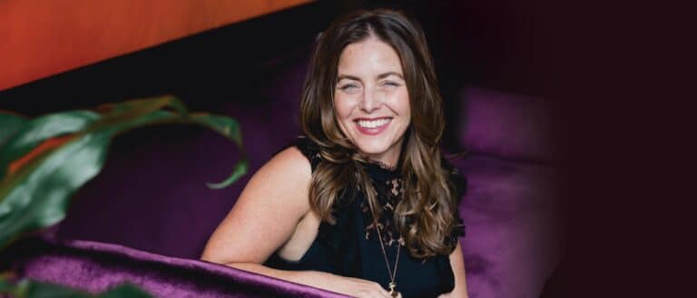 Bari Tessler on a purple velvet couch in Montreal