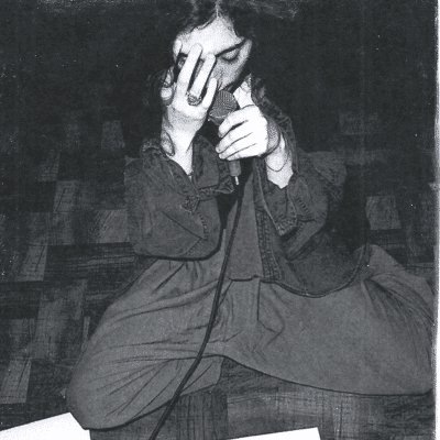 A person holding a microphone