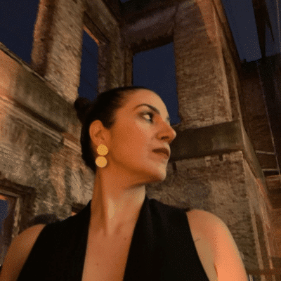 Poupeh-Misaghi in a black dress