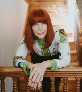 A woman leaning on a railing