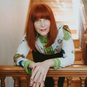 A woman leaning on a railing