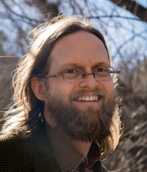 Travis Cox headshot